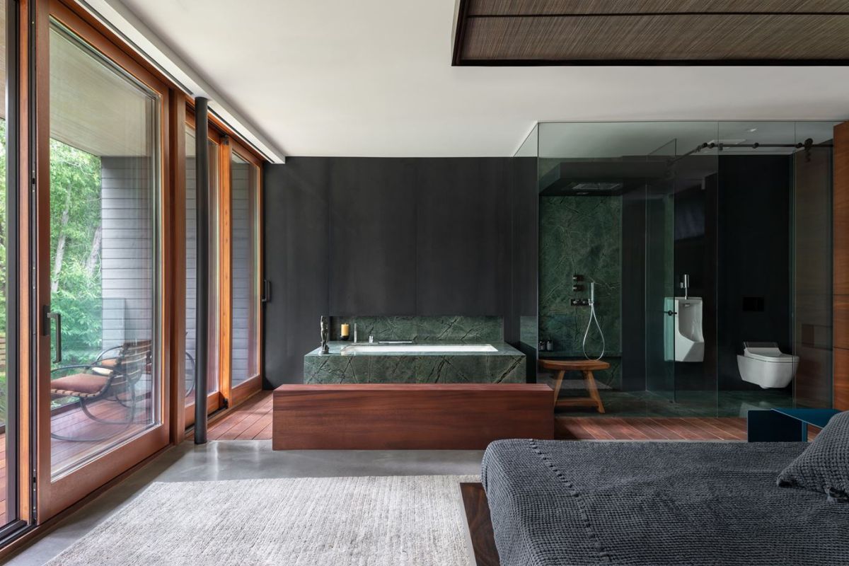 Bedroom with bathroom and glass walk in shower