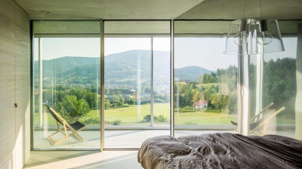 Bedroom with large windows and amazing views