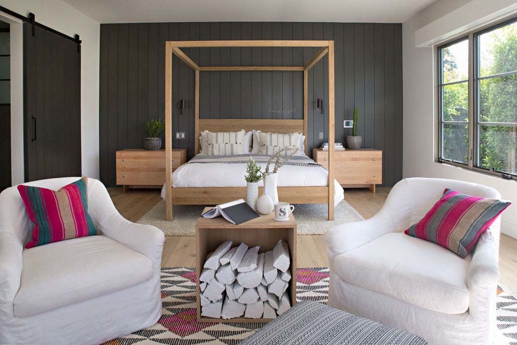 Bedroom with wall wood and canopy bed