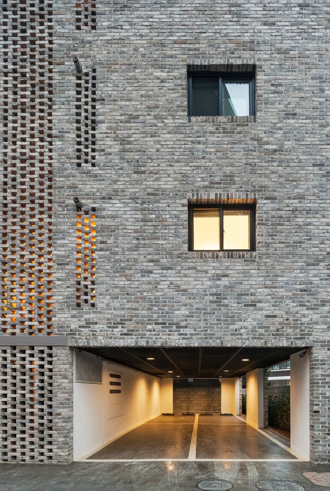 Beyond the Screen brick facade - OBBA - exterior