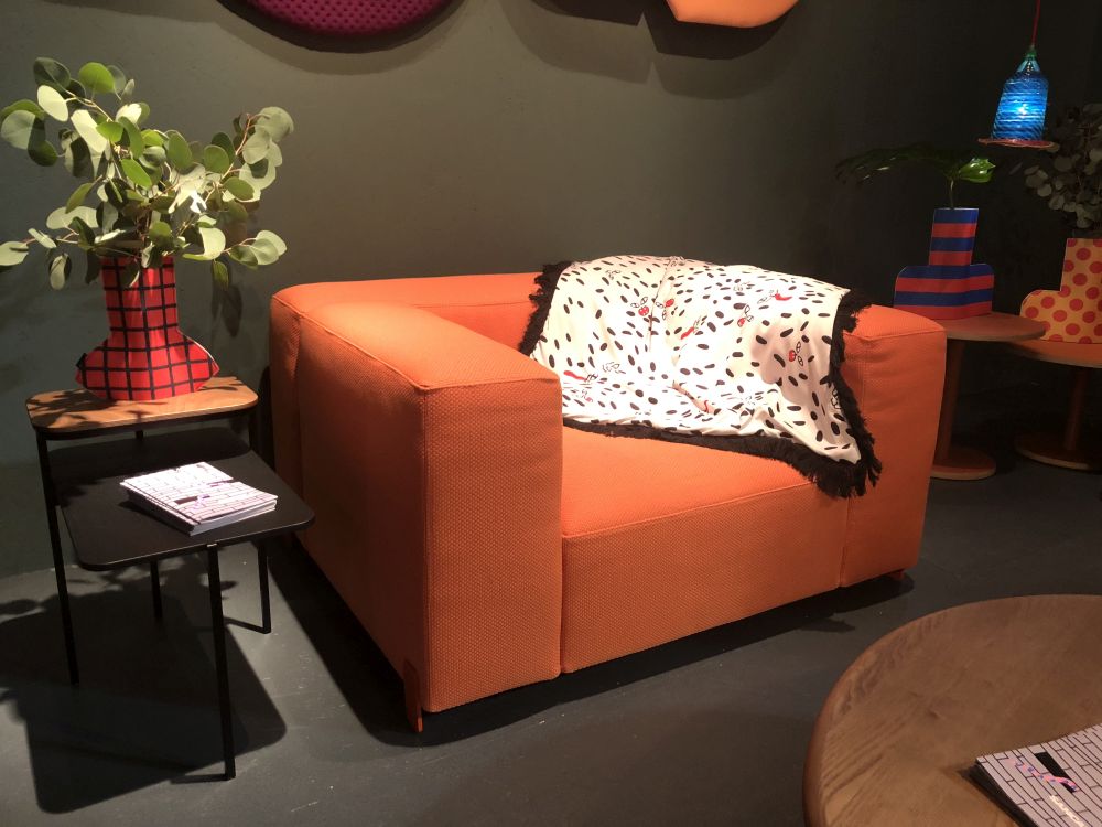 Big armchair upholstered in orange