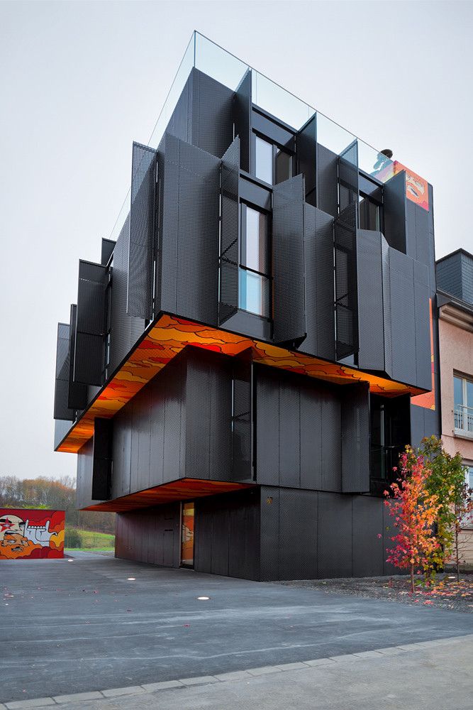Black Apartment Building in Luxembourg by Metaform Architects