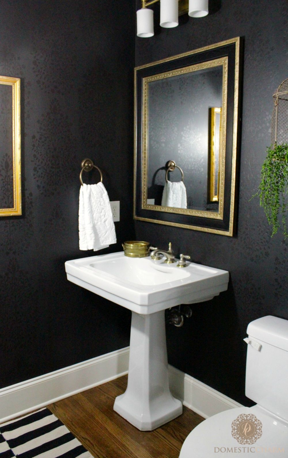 Black and gold powder room