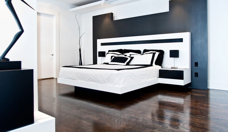 This very modern black and white floating bed unit is indeed a good example of a floating bedroom system.  