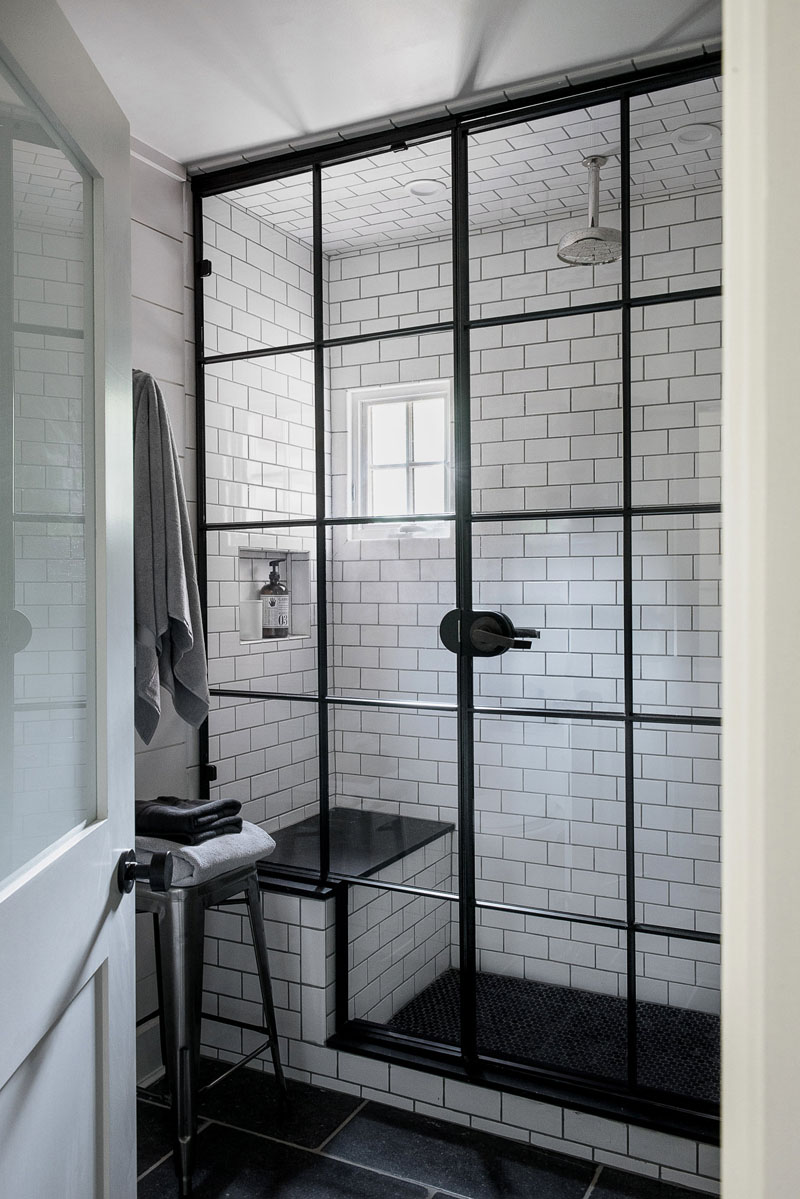 Black and white subway tiles shower design