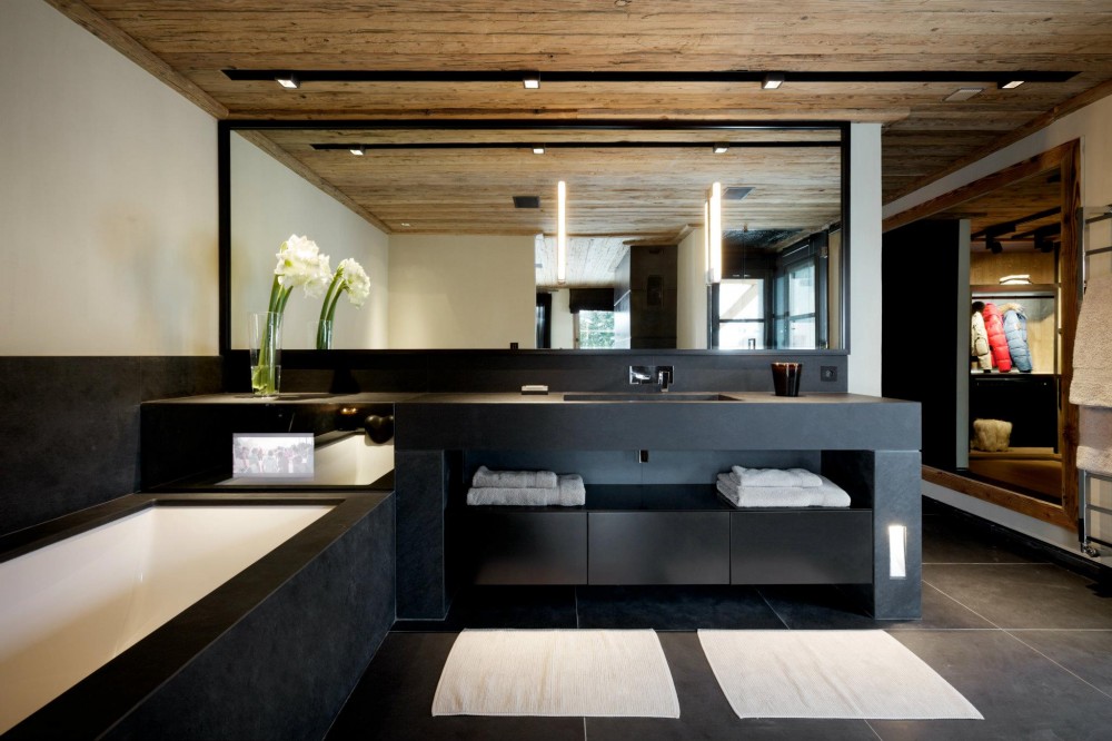 Black bathroom with wooden ceiling