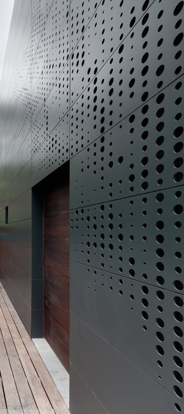 Black casa alta perforated facade closer