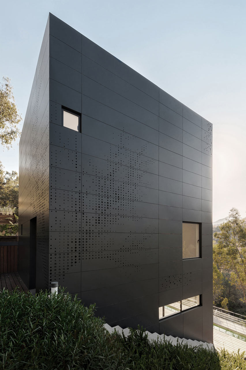 Black casa alta perforated facade