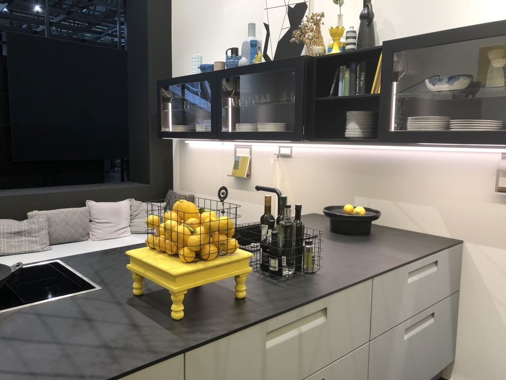 Black glass cabinets and dark countertop