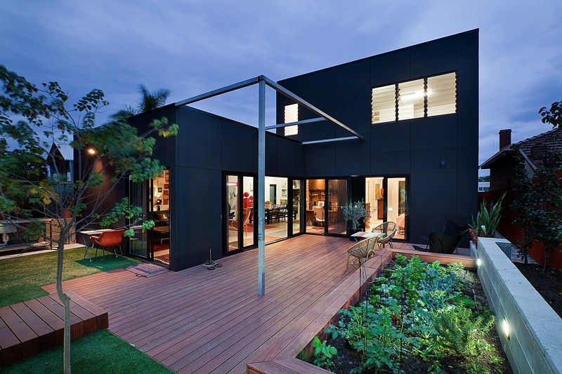 Black house with wood deck Philip Stejskal Architecture