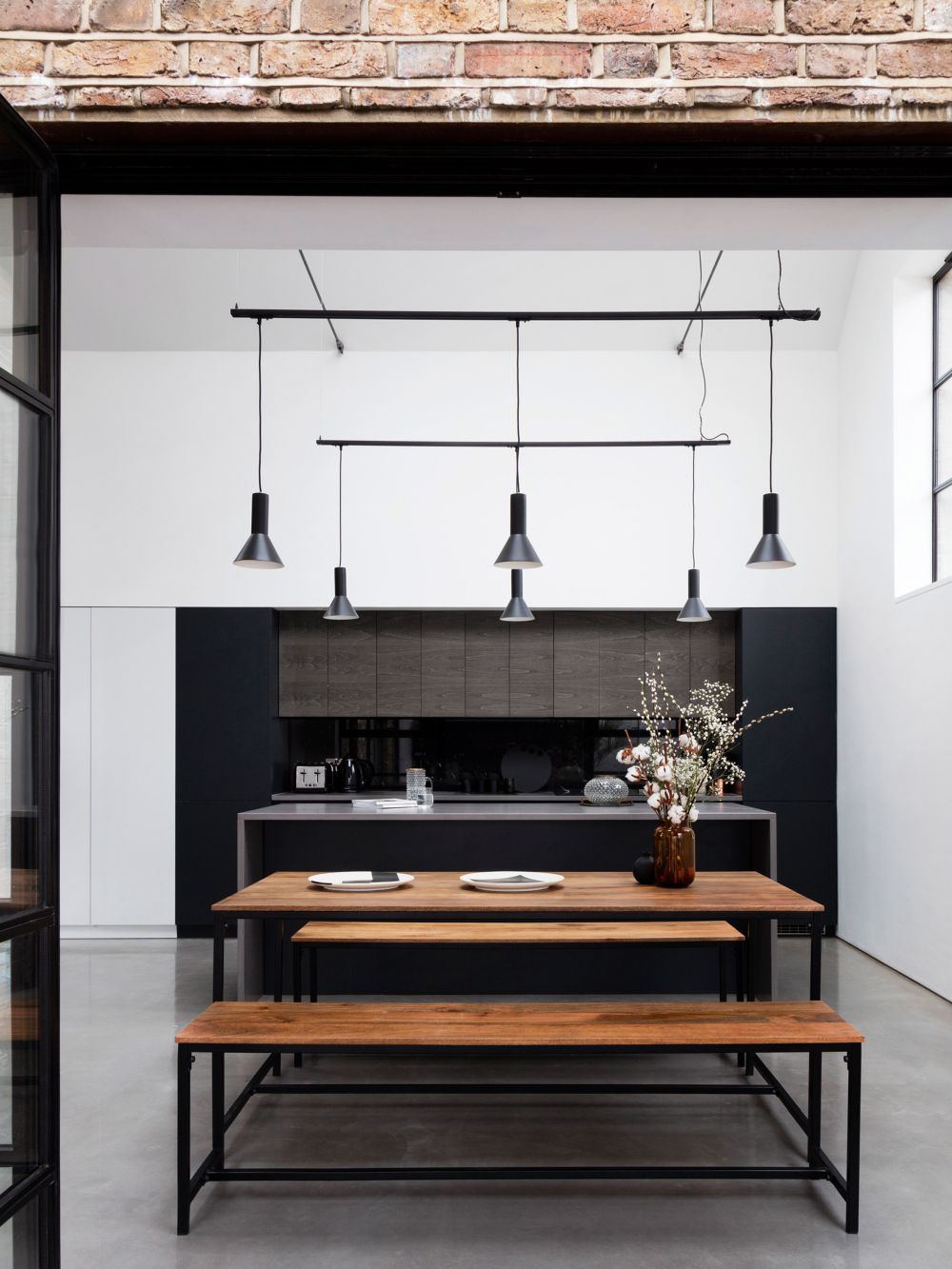 Black kitchen Former warehouse into home by Paper House Project