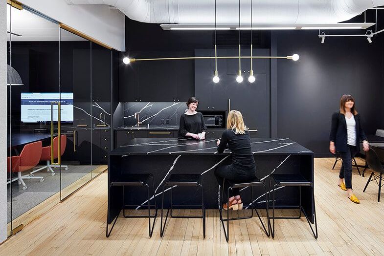 Black kitchen with marble island