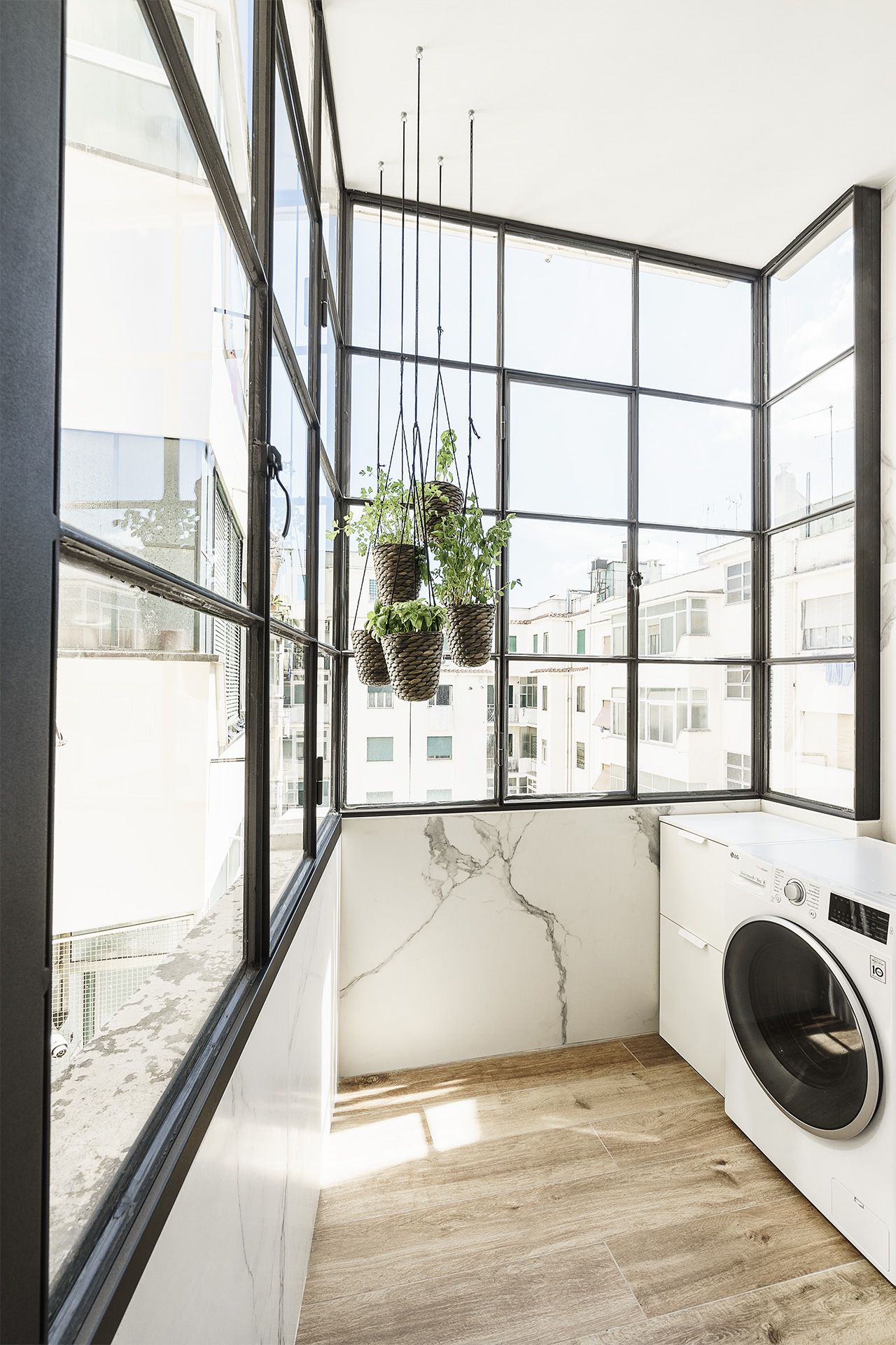 This lovely laundry room makes the task a delight.