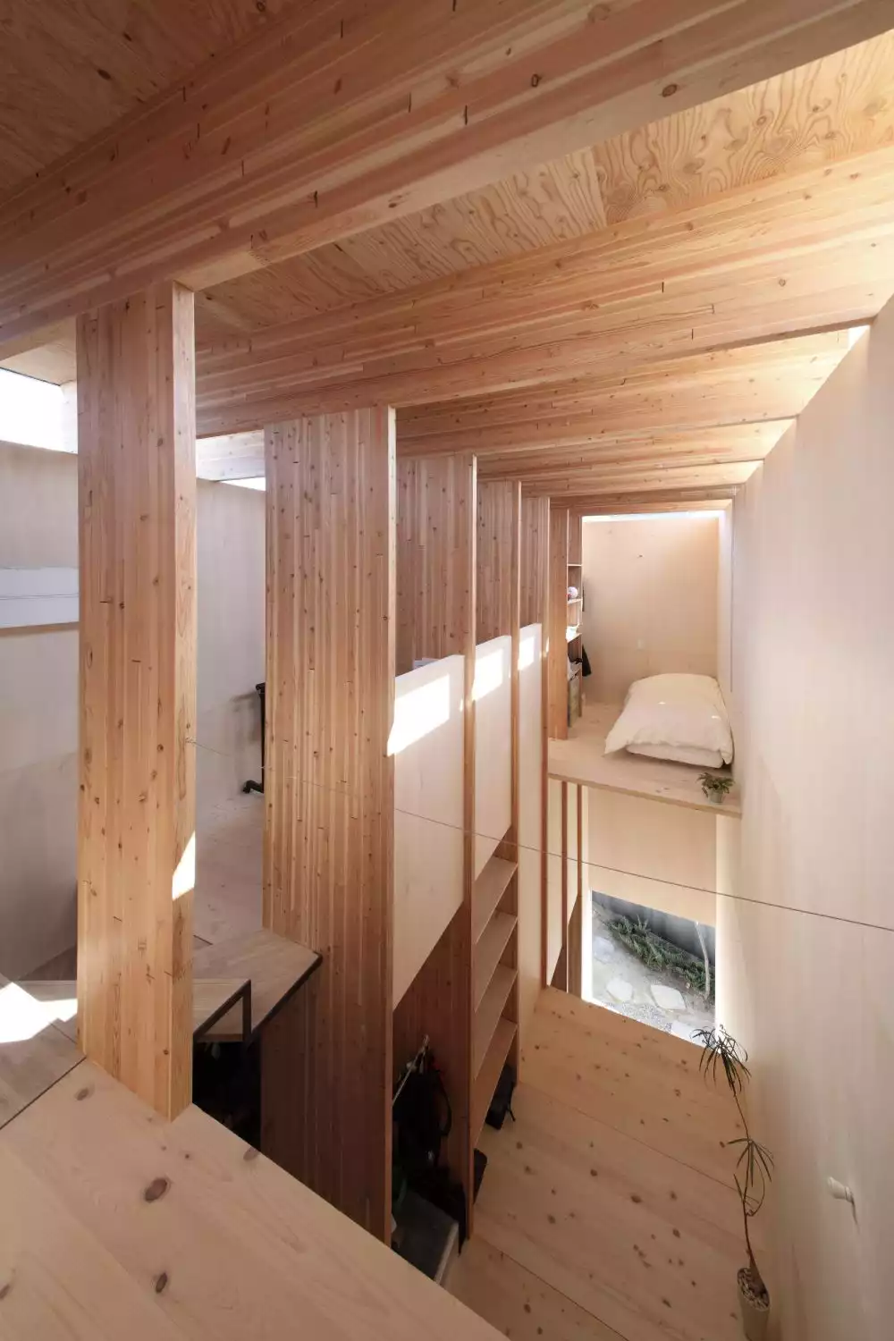 Black wood cladding Aichi Prefecture house - bed area