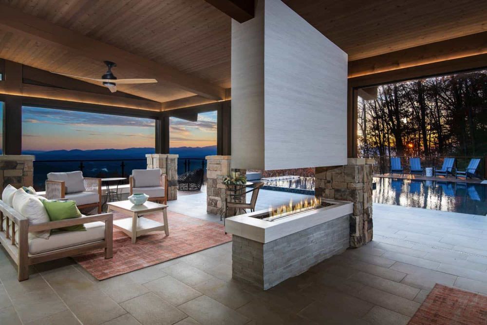 Blue Ridge Mountains Residence by Retro Fit Design in collaboration with Living Stone Design outdoor fireplace divider