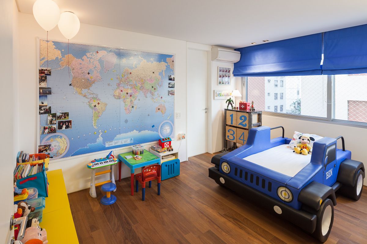 Blue boys room with car bed