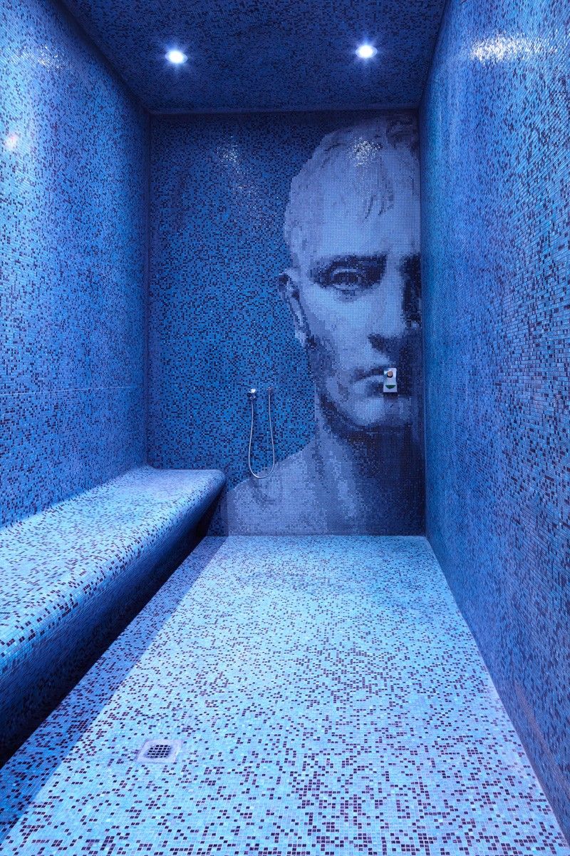 Blue mosaic bathroom with shower