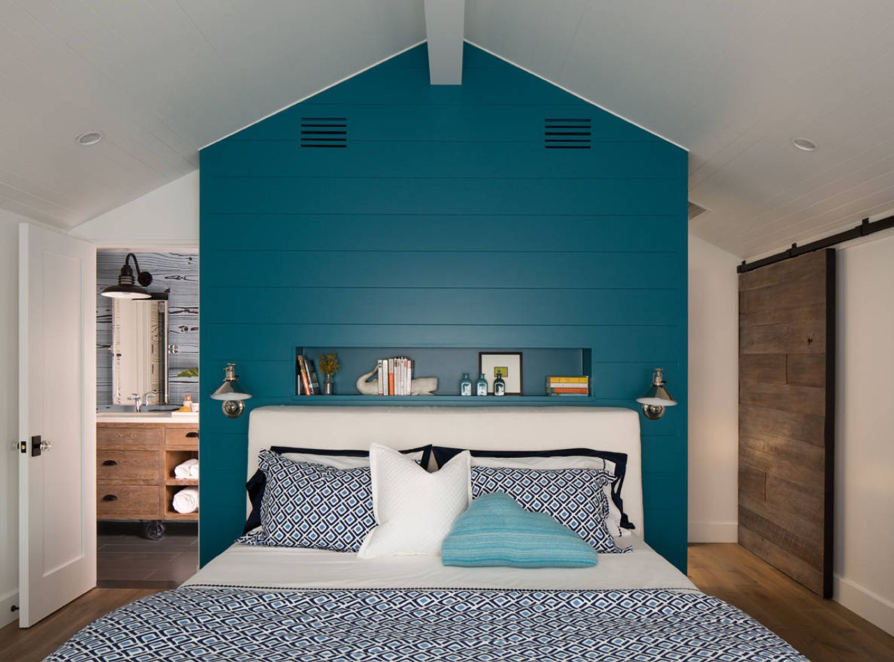 Blue shiplap bedroom wall