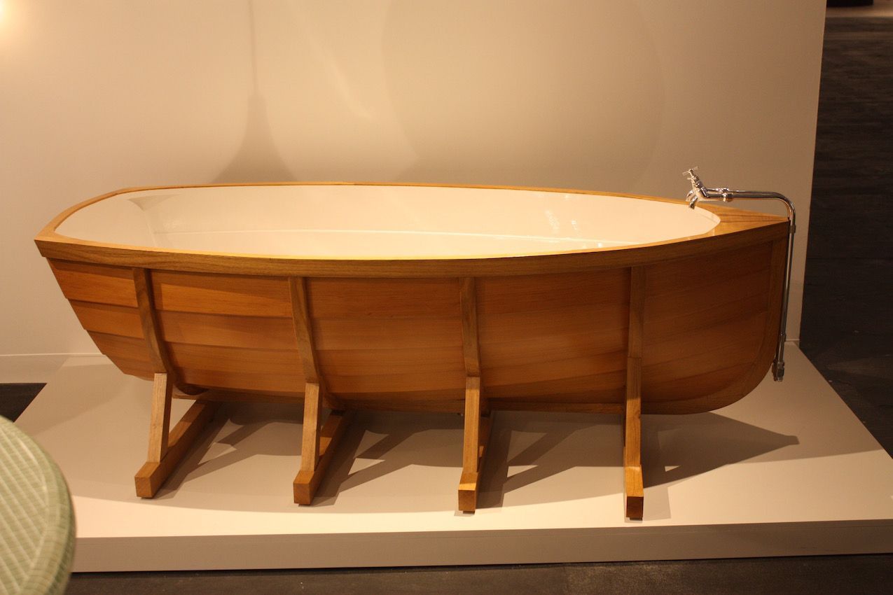 Again, not a traditional stating tub, but still a wooden bathtub, is this boat-shaped art tub sold by Gallerie Kreo. It is designed by Dutch firm Studio Wieki Somers.