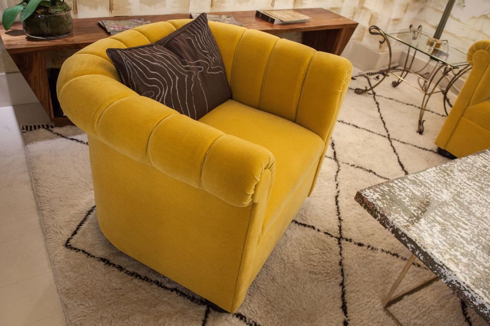 Bold yellow armchair for a touch of color to any room