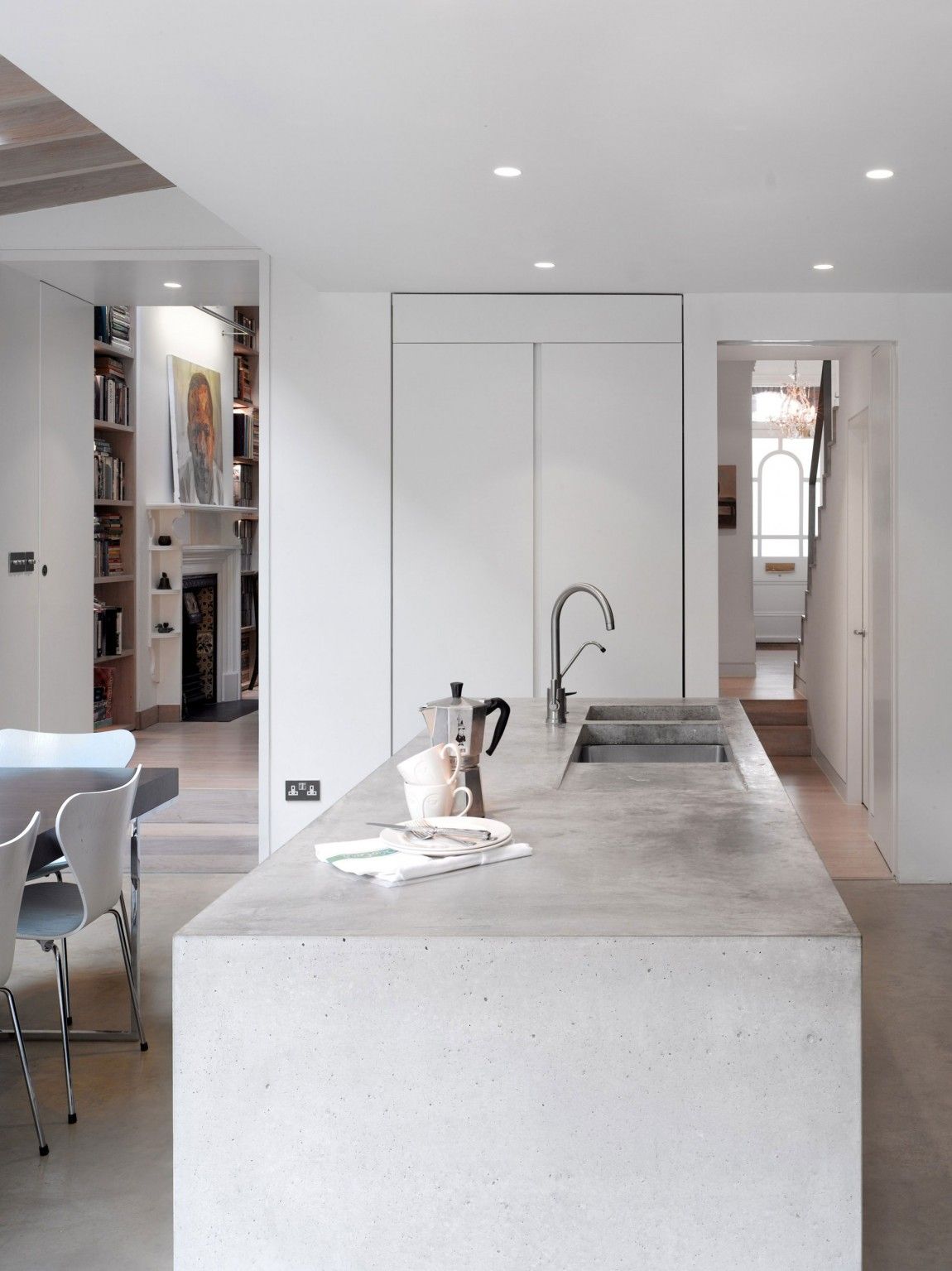 Book tower house concrete kitchen design