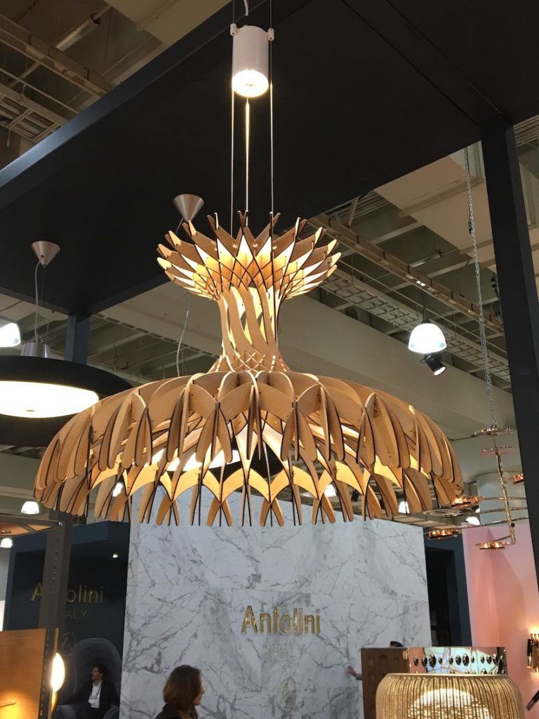 The Dome 90 pendant by Bover Barcelona is made of more than 170 wood fragments are intertwined and sewn together one by one.