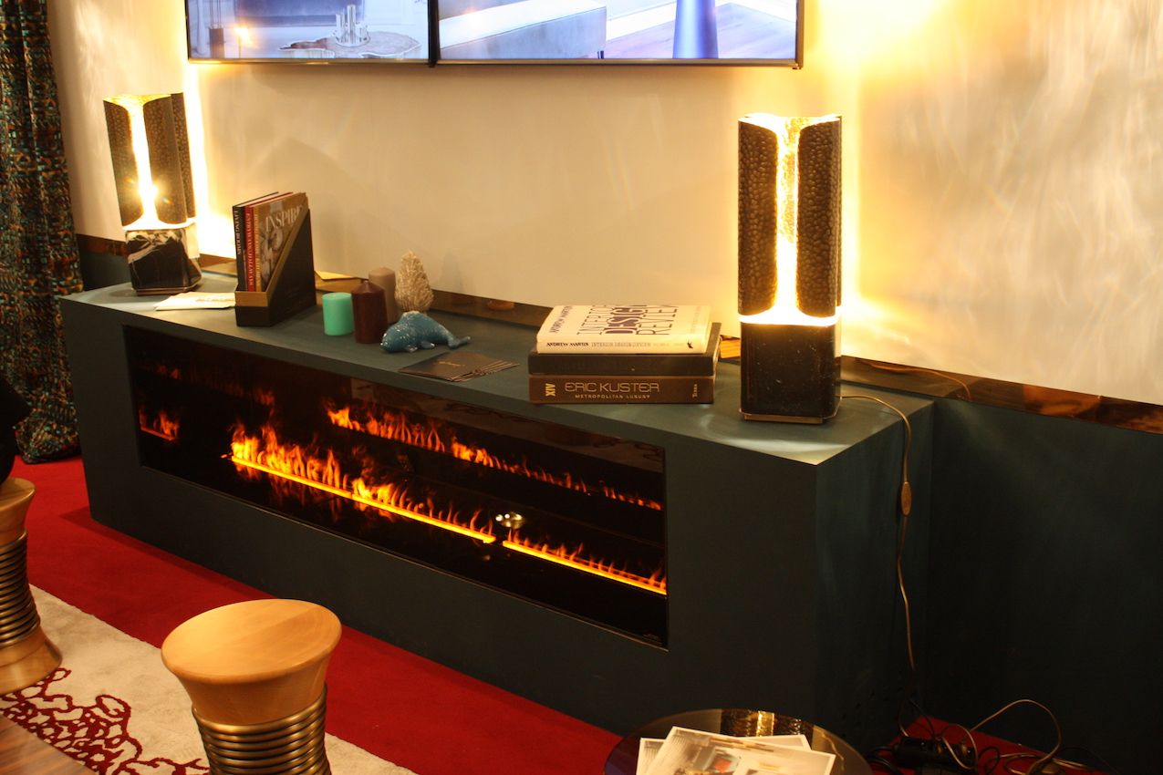 Brabbu's cabinet features a long row of flames inside a cabinet that can still sport accessories on top.