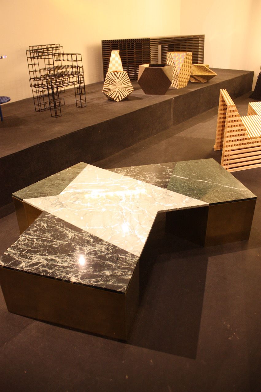 LA-based designer Brian Thoreen created this geometric coffee table in mixed black marbles, brass, steel, and wood. Handles by the Patrick Parrish Galery, the table comes in various colors.