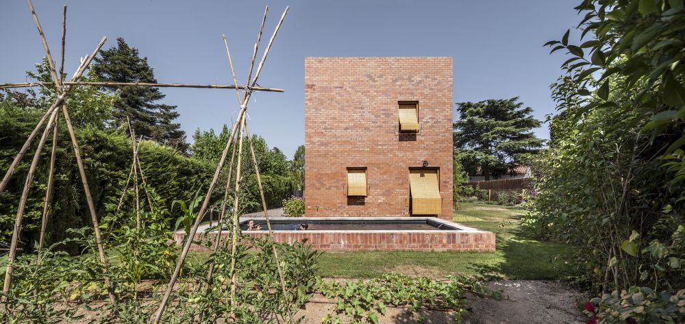 Brick house backyard design