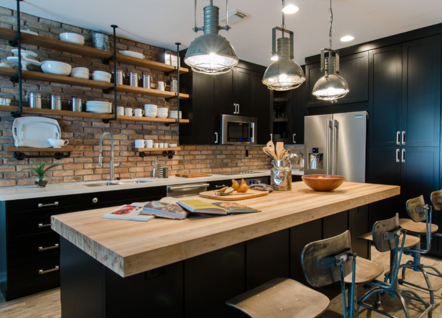 Brick kitchen backsplash with black cabinets