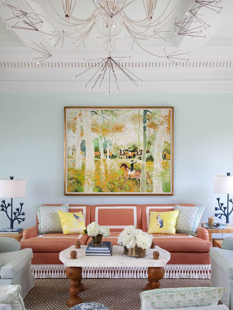 Bringing coral color into living room with sofa
