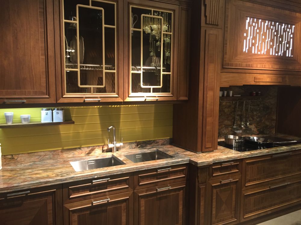 Brown kitchen design with leaded glass doors