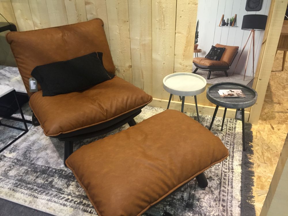 Matching sets of lounge chairs and footstools or ottomans are perfect for reading nooks