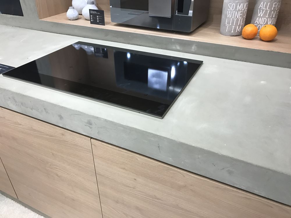 Built in induction cooktop for a cement countertop