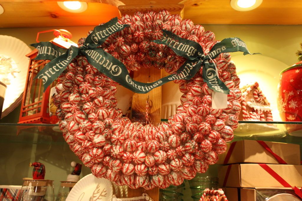 Children and adults alike will love a wreath made of candy-cane striped balls.