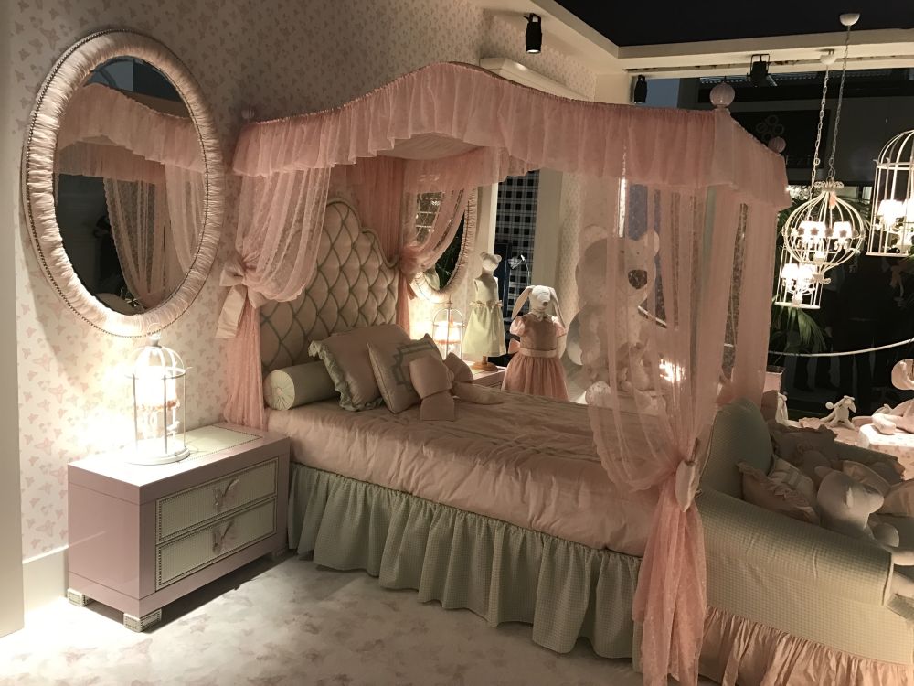 Canopy style bedroom decor in pink