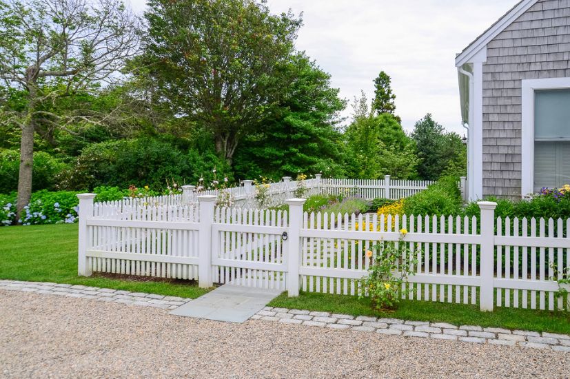 Cape cod homes with white picket fence