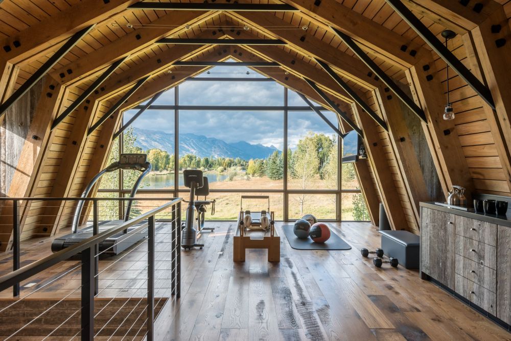 The upper floor is a very cozy workout area with a panoramic views of the surroundings