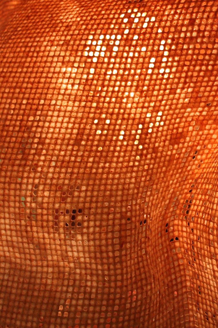 A close-up of the mesh, which gives the impression of a hot air balloon, especially when lit. These lamps would be an interesting, organic design addition.