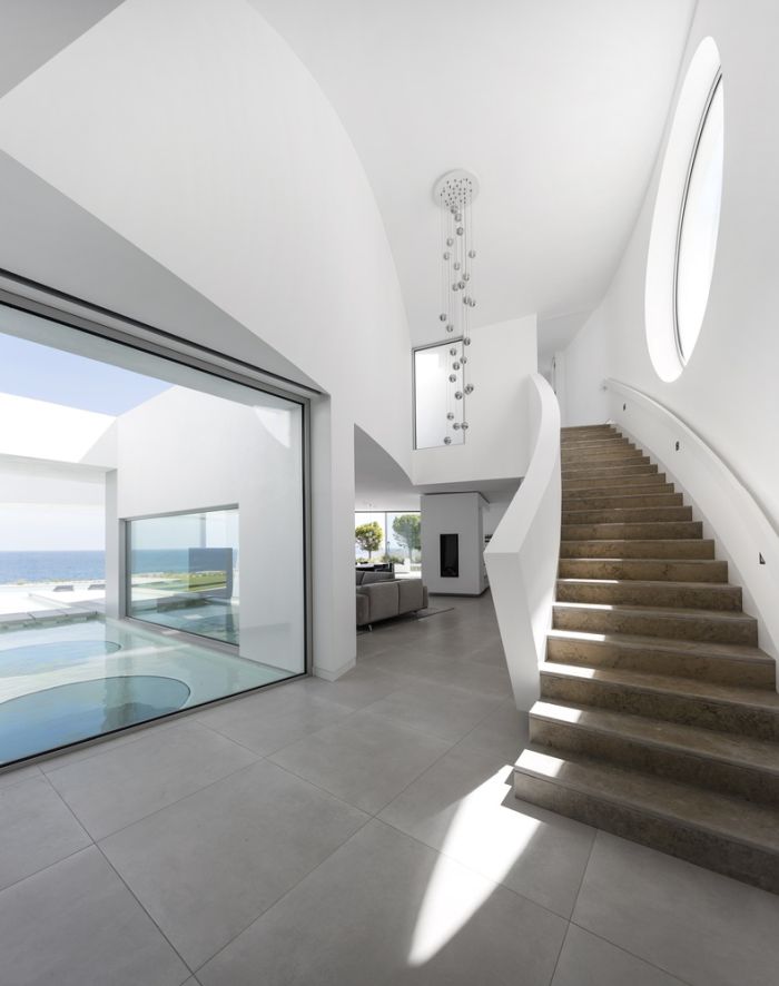 Casa Eliptica by Mario Martins Atelier staircase