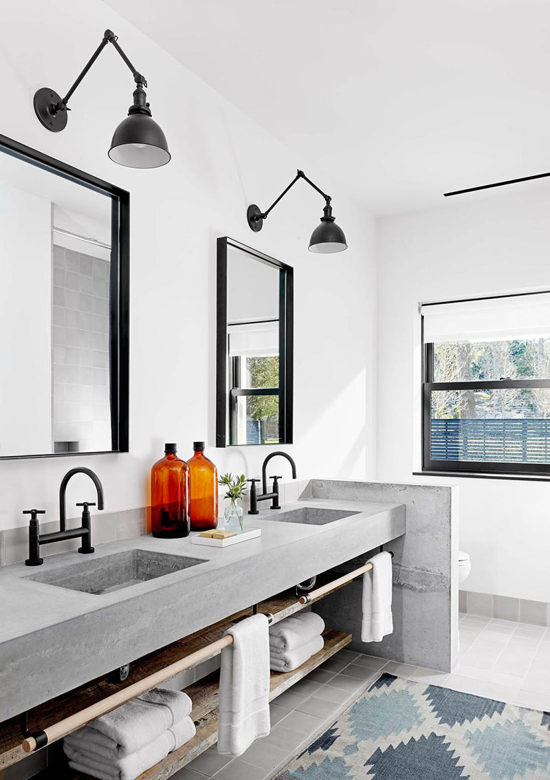 Cement bathroom vanity countertop design and black faucet