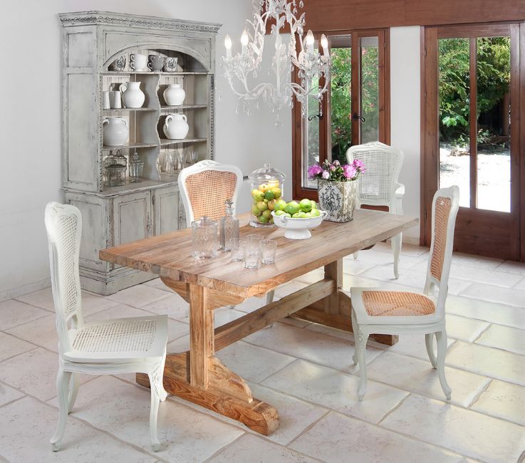 Chandelier over trestle dining table