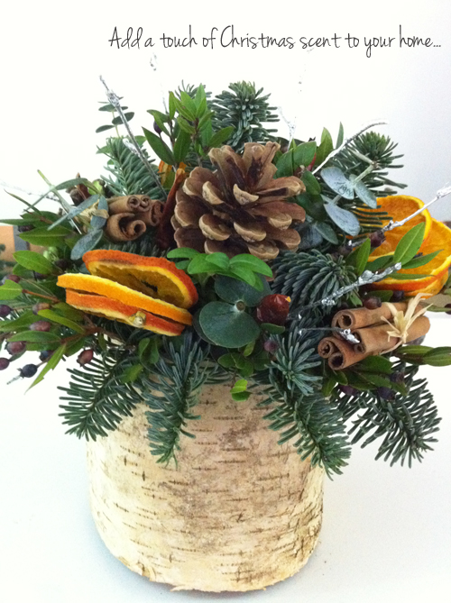 Christmas Table arrangement with pine cones