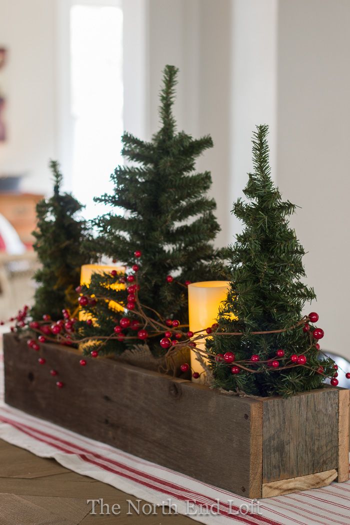 Christmas home table center with mini trees