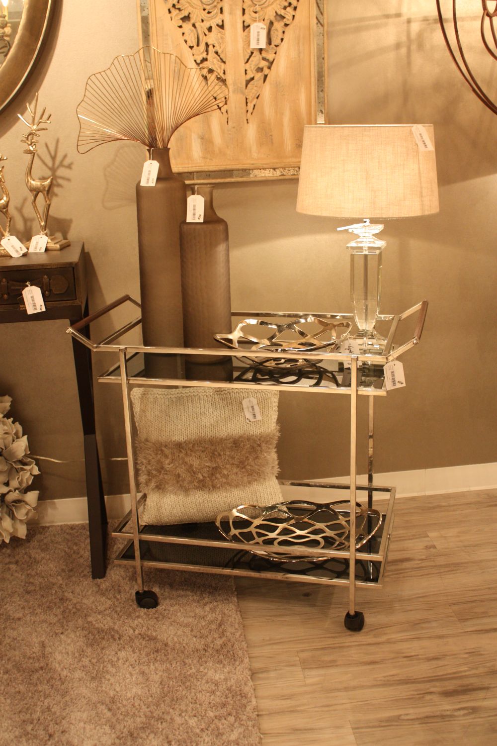 Chrome bar cart with glass shelves