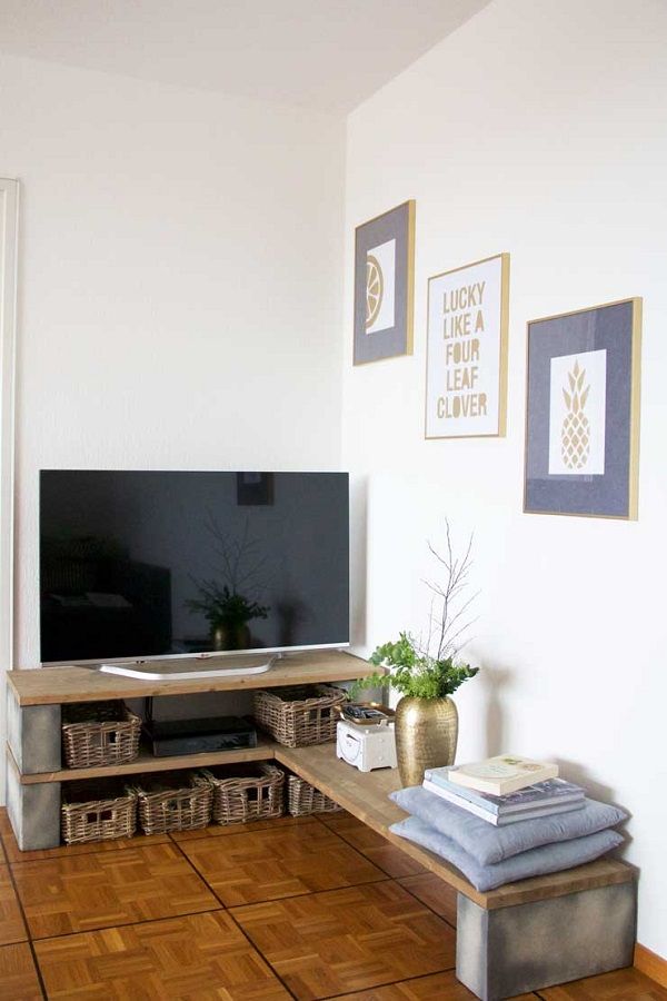 Cinder bloks and wood shelf for TV stand