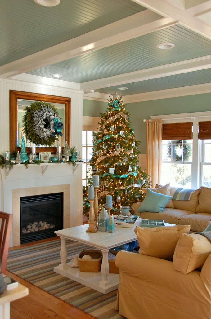 Coastal Christmas tree decor and wreath above mantel