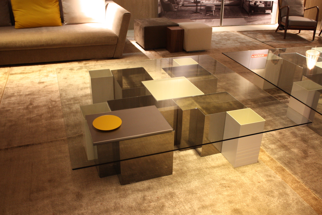 Of course, if you like the cube coffee table concept, here's a larger and more luxe verision from Flexform. The large, hefty glass top gives you a good view of the artistic design of cube shapes included in the base of this massive coffee table.