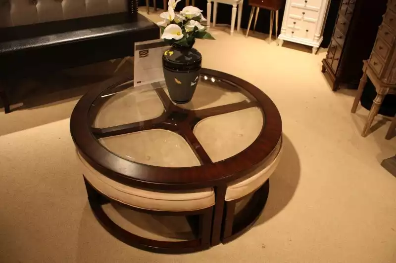 Coffee table with chairs under