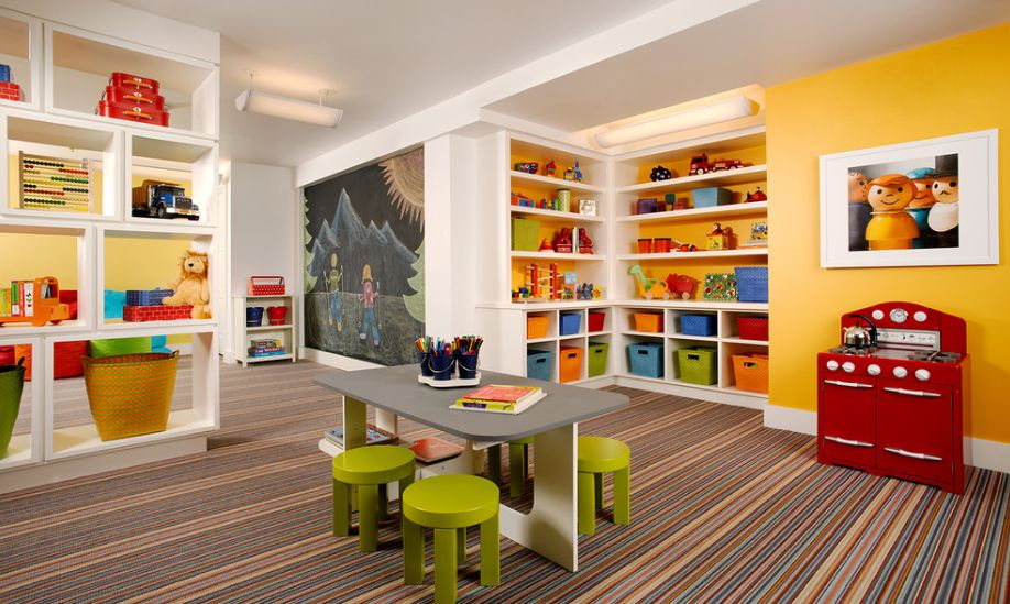 Colorful plaryroom with tons for storage spaces